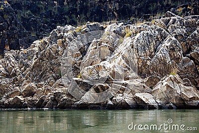 Marble Rocks on River Bank Stock Photo