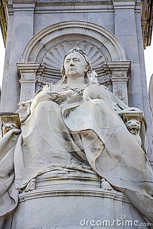 Sculpture of Queen Victoria at Victoria Memorial in front of Buckingham Palace, London, United Kingdom Editorial Stock Photo