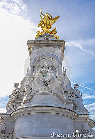 Sculpture of Queen Victoria at Victoria Memorial in front of Buckingham Palace, London, United Kingdom Editorial Stock Photo