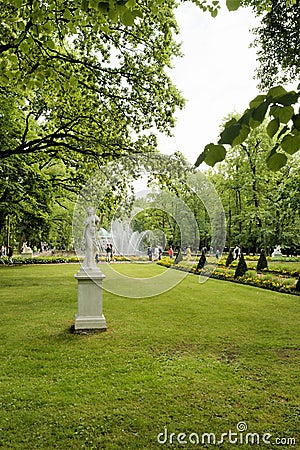 Petergof, Russia, July 2019. Statue on the park lawn near the fountain. Editorial Stock Photo