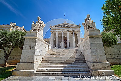 Marble statues of Plato and Socrates, ancient Greek philosophers, in chairs, main entrance to Academy of Athens Stock Photo