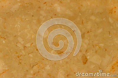 Marble texture. The background is a palyned plate. A product made of stone. Fragments of small stones. Stock Photo