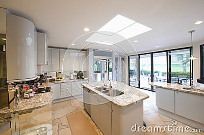 Marble Topped Worktop Units In Modern Kitchen Stock Photo