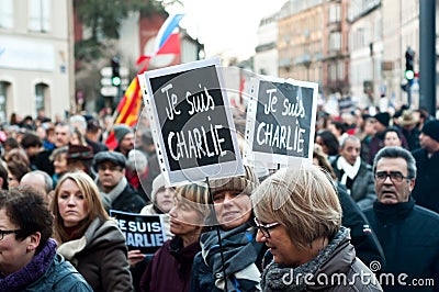 March against Charlie Hebdo magazine terrorism attack, on January 7th, 2015 in Paris Editorial Stock Photo