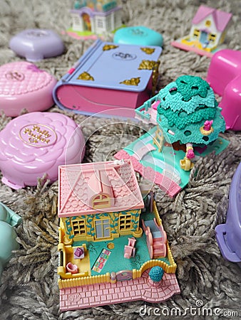 Collection of Polly Pocket`s, miniature dollhouses, that were very popular in the 90`s and now are coveted Editorial Stock Photo