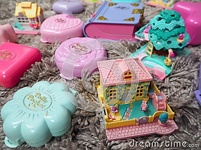 Collection of Polly Pocket`s, miniature dollhouses, that were very popular in the 90`s and now are coveted Editorial Stock Photo