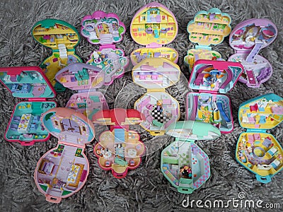 Collection of Polly Pocket`s, miniature dollhouses, that were very popular in the 90`s and now are coveted Editorial Stock Photo