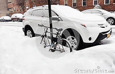 March bicycle under snow in new york Editorial Stock Photo