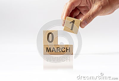 1 March inscription on wooden calendar. Hello spring Stock Photo