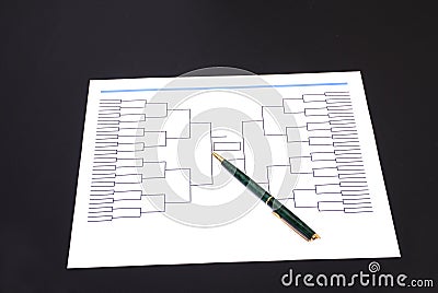 March Madness Pen and Blank Tournament Bracket Stock Photo