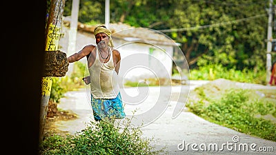 farmer standing road side image Editorial Stock Photo