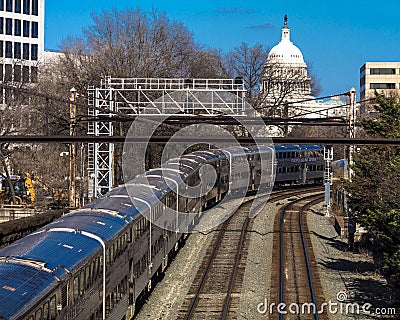 MARCH 26, 2108 - Passenger Metro train with US Capitol in background approaches L'enfant Plaza. L'enfant, modern Editorial Stock Photo