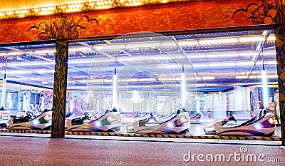 Colorful electric bumper car in autodrom in Viennese Prater at night Editorial Stock Photo
