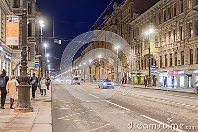 evening city street lit by lanterns Editorial Stock Photo