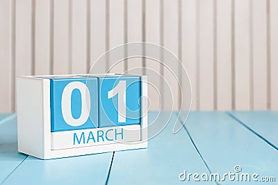 March 1st. Image of march 1 wooden color calendar on white background. First spring day, empty space for text Stock Photo