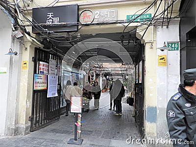 20 March 2019 - Tourists walking through the alley street of Famous Tianzifang market Exit Gate No.2, Shanghai, China Editorial Stock Photo