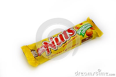 March 22, 2022, Ukraine city Kyiv Nuts cocoa chocolate bar from the Nestle company on a white background Editorial Stock Photo