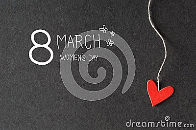 8 March Womens Day message with paper hearts Stock Photo