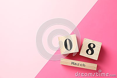 8 march wooden calendar on two tone background Stock Photo