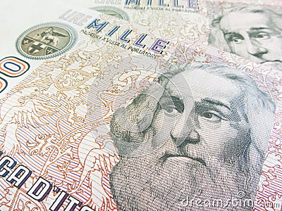 Marco Polo over an old one thousand Lire Italian bill Stock Photo