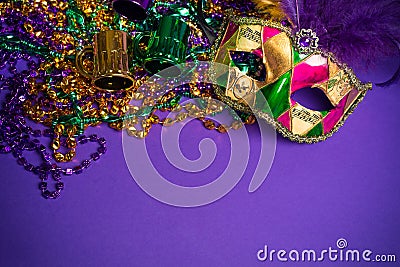 Mardi Gras or Carnivale mask on a purple backgroun Stock Photo