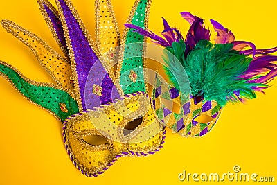 Mardi Gras Mask son yellow Background Stock Photo