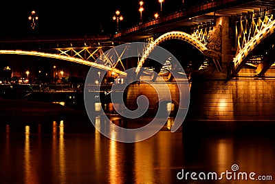 night view of the Margaret bridge in Budapest. reflections on the water. closeup view. Stock Photo