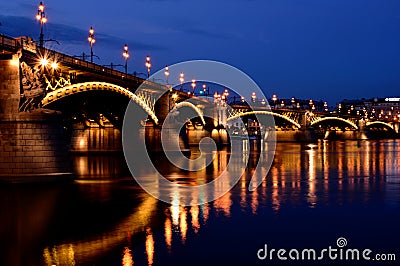 The Margaret bridge in Budapest with reflections at blue hour. closeup view. Stock Photo