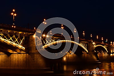 The Margaret bridge in Budapest with reflections on the water. closeup view. Stock Photo