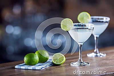 Margarita. Margatita alcoholic cocktail drink on barcounter in p Stock Photo