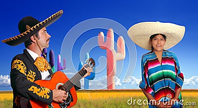 Mariachi charro playing guitar mexican poncho girl Stock Photo