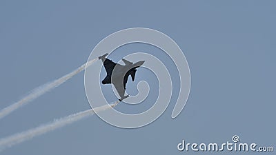Military fighter jet airplane in blue sky Editorial Stock Photo