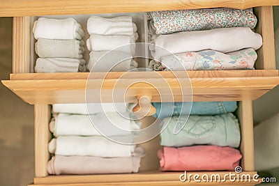 Marie Kondo tyding up method concept - folded clothes Stock Photo