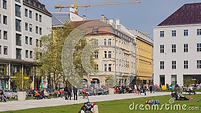 Marienhof munich bavaria park sunny spring day pedestrians Editorial Stock Photo