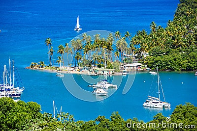 Marigot Bay, Saint Lucia, Caribbean. Tropical bay and beach in exotic and paradise landscape scenery. Marigot Bay is located on Editorial Stock Photo