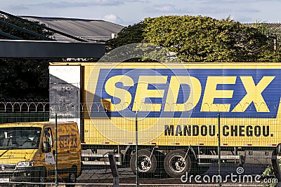 Trucks and vans for Sedex delivery stopped at the Correios Distribution Center in Editorial Stock Photo
