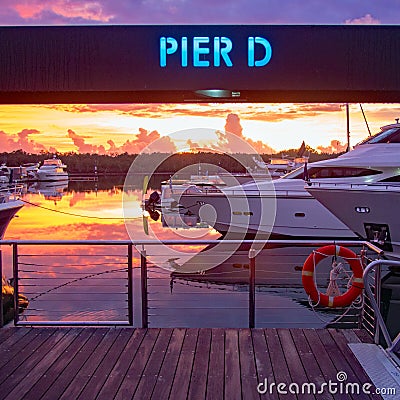 Marina bay with boats at dusk Pier D Stock Photo