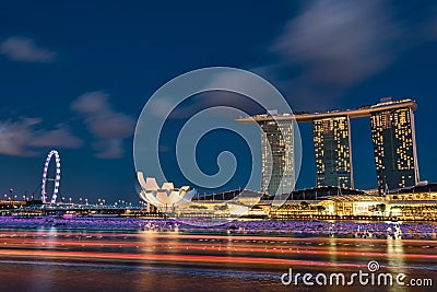 Marina Bay Sands and Singapore Flyer as seen from Fullerton Bay at night Stock Photo