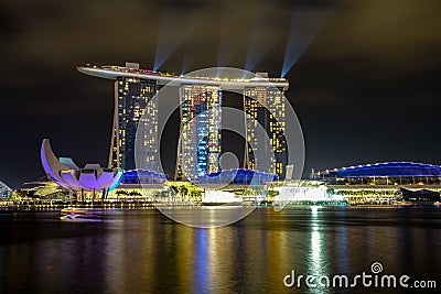 MARINA BAY,SINGAPORE - APRIL 10,2016:laser show at Marina Bay Sands Hotel in night at Singapore Editorial Stock Photo