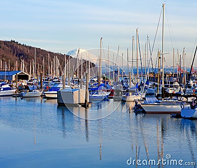 Marina with boats and Mt.Ranier in Tacoma, WA. Stock Photo