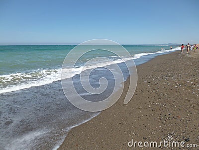 Marina di Bibbona, Livorno. Beautiful sandy beach, sea on a sunny summer day, people Editorial Stock Photo