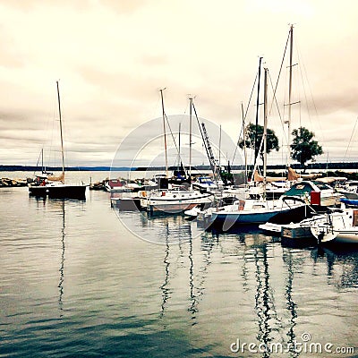 A marina with docked sailboats. Copy space. Square. Stock Photo
