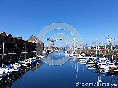 Marina reflections at the James Watt Dock Stock Photo