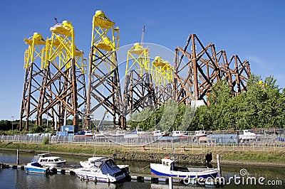 Marina, and Wind turbine bases being constructed Editorial Stock Photo