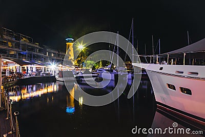 Marina with yachts and boat at the night Stock Photo