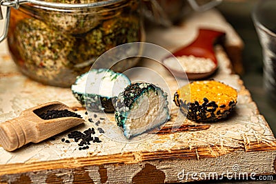 Marinated goat cheese with olive oil and. Organic farm dairy products, cheeses Stock Photo