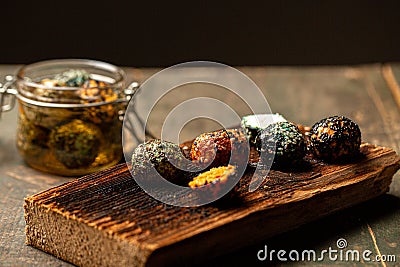 Marinated goat cheese with olive oil and, selective focus Stock Photo