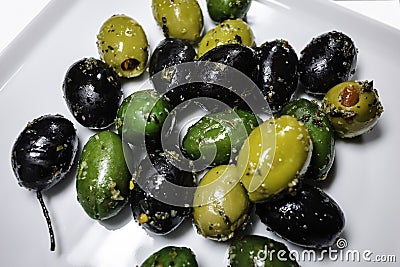 Marinated green and black olives Stock Photo