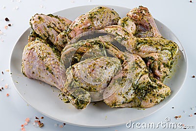 marinated raw grilled chicken in pesto sauce Stock Photo