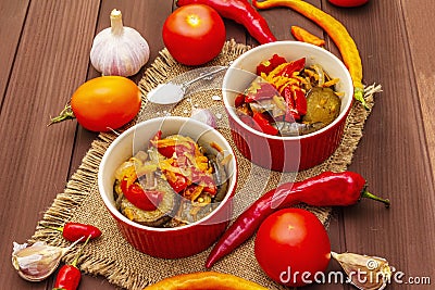 Marinated salad with pickled vegetables: eggplant, carrot, pepper, tomato, garlic Stock Photo